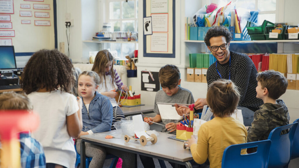 building in elementary class with their teacher